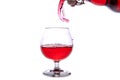 moving a glass of red wine on a white background Royalty Free Stock Photo