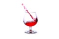 moving a glass of red wine on a white background Royalty Free Stock Photo