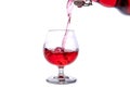 moving a glass of red wine on a white background Royalty Free Stock Photo
