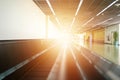 Moving horizontal walkway escalator travelator/sidewalk in international airport terminal in the morning Royalty Free Stock Photo