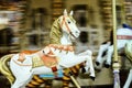 Moving horses on classic french carousel Royalty Free Stock Photo