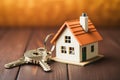 Moving house, Key house keychain in new home. Buy or rent real estate concept Royalty Free Stock Photo