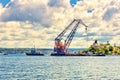 Moving a large floating port crane Royalty Free Stock Photo