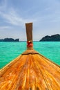 Moving on long tail boat on blue tropical Thailand sea Royalty Free Stock Photo