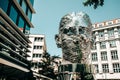 Moving mirror statue of Franz Kafka by David Cerny. Big metalmorphosis head sculpture.