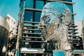 Moving mirror statue of Franz Kafka by David Cerny. Big metalmorphosis head sculpture.