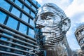 Moving monument head Franz Kafka in the center of Prague. art object chromed shiny sculpture of 64 plates