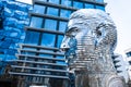 Moving monument head Franz Kafka in the center of Prague. art object chromed shiny sculpture of 64 plates