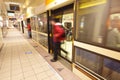 Moving people leaving train at metro station Royalty Free Stock Photo