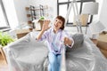 smiling asian woman taking selfie at new home Royalty Free Stock Photo