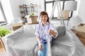 smiling asian woman taking selfie at new home Royalty Free Stock Photo