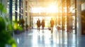 Moving people walk by Beautiful high walls white entrance hall in modern business center with sunny day windows, glass doors. Eco Royalty Free Stock Photo