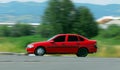 Moving red car Royalty Free Stock Photo