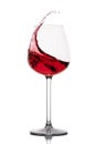 Moving red wine glass over a white background Royalty Free Stock Photo