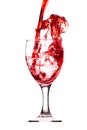 Moving red wine Splash two glass over a white background Royalty Free Stock Photo