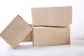 Moving in. Stack of cardboard boxes on white background. Close up Royalty Free Stock Photo