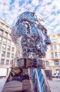 Moving statue of Franz Kafka in Prague, purple filter Royalty Free Stock Photo