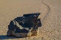 Moving Stones at the Racetrack Playa in Death Valley California with a depth of field