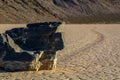 Moving Stones at the Racetrack Playa in Death Valley California with a depth of field Royalty Free Stock Photo