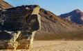 Moving Stones at the Racetrack Playa in Death Valley California with a depth of field Royalty Free Stock Photo