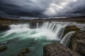 Long exposure of dark clouds over Godafoss Waterfall in Icealnd Royalty Free Stock Photo