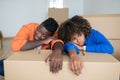 Moving Stress. Black Couple Feeling Tired While Relocating Home