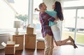 Moving into their dream house. a young couple moving into their new home. Royalty Free Stock Photo