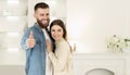 Moving To New Apartment. Couple Showing Thumb Up Royalty Free Stock Photo