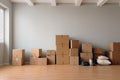 Moving to new home donation concept with stack of cardboard boxes and cat sitting inside a box Royalty Free Stock Photo