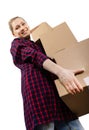 Moving to new house - smiling young woman with stack of cardboard boxes Royalty Free Stock Photo