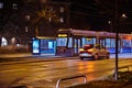 Moving tram at night. Public transport at night. Moving streetcar at night
