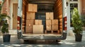 Moving Van On Street With Ramp, Boxes And Household Furnishings Royalty Free Stock Photo
