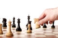 Moving white chess knight on a chessboard Royalty Free Stock Photo
