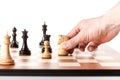 Moving white chess knight on a chessboard Royalty Free Stock Photo