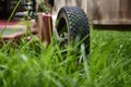 Mow lawn low angle of lawnmower cutting grass. Royalty Free Stock Photo