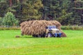 The mowers load the hay into a large lorry Royalty Free Stock Photo