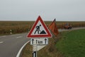 Mowing work and its road sign on a federal road in Germany Royalty Free Stock Photo