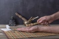 Moxibustion therapy - Traditional Chinese Medicine. Placement of the burning moxa stick on the hand. Royalty Free Stock Photo