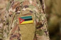 Mozambique flag on soldiers arm. Mozambique troops collage