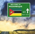 Mozambique road sign against clear blue sky Royalty Free Stock Photo