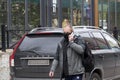 Mozhaysk, Moscow Region, Russia: 05.08.2020. Coronavirus pandemic. Man with face protective mask talking on the phone