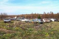 Old retro rusty abandoned cars junkyard. Vintage car outdoor Royalty Free Stock Photo