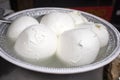 Mozzarella balls in basin for sale at a farmers market