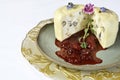 Mozzarella cheese stuffed with nuts cut in half with strawberry jam Royalty Free Stock Photo