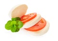 Mozzarella cheese and tomato on a white isolated background Royalty Free Stock Photo