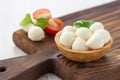 Mozzarella cheese in wooden bowl. Royalty Free Stock Photo