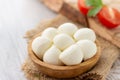 Mozzarella cheese in wooden bowl Royalty Free Stock Photo