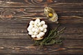 Mozzarella cheese in a wooden bowl with spices and butter on a wooden table Royalty Free Stock Photo