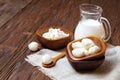 Mozzarella cheese in a wooden bowl on the table Royalty Free Stock Photo