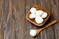 Mozzarella cheese in a wooden bowl on the table Royalty Free Stock Photo